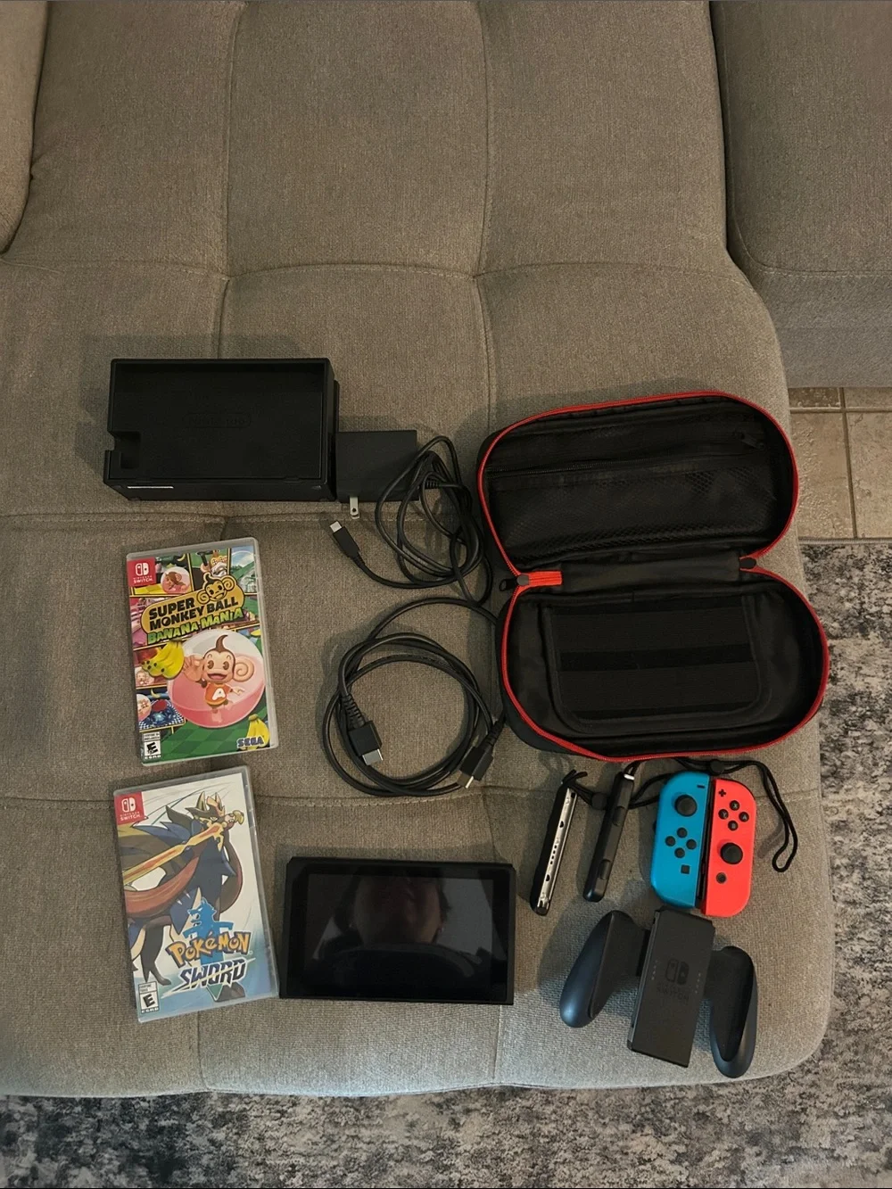 Nintendo Switch with Neon Blue & Neon Red Joy‑Con and Accessories